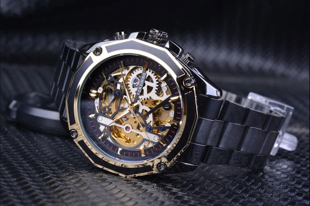 นาฬิกาข้อมือ Forsining สายสแตนเลสดำ รุ่น GMT982 หน้าปัดทอง